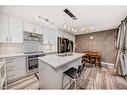 6-6819 Centre Street Nw, Calgary, AB  - Indoor Photo Showing Kitchen With Stainless Steel Kitchen With Double Sink With Upgraded Kitchen 