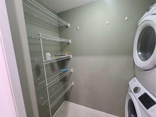 4319-4975 130 Avenue Se, Calgary, AB - Indoor Photo Showing Laundry Room