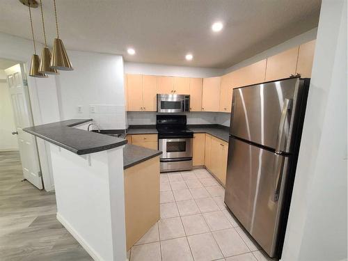 4319-4975 130 Avenue Se, Calgary, AB - Indoor Photo Showing Kitchen With Stainless Steel Kitchen