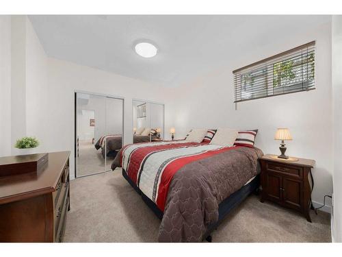 98 Williamstown Landing Nw, Airdrie, AB - Indoor Photo Showing Bedroom