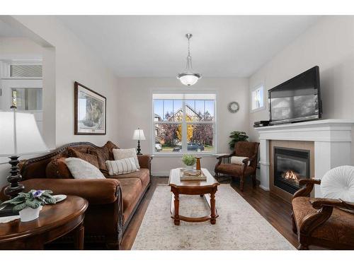 98 Williamstown Landing Nw, Airdrie, AB - Indoor Photo Showing Living Room With Fireplace