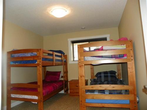 4025-25054 South Pine Lake Road, Rural Red Deer County, AB - Indoor Photo Showing Bedroom