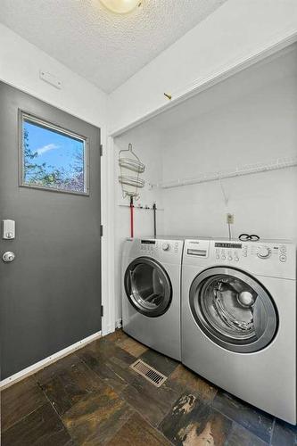 105 Patina Park Sw, Calgary, AB - Indoor Photo Showing Laundry Room