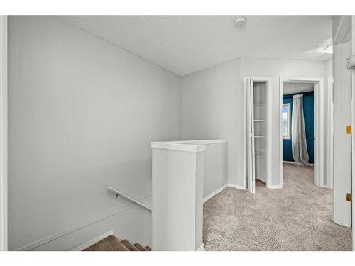 105 Patina Park Sw, Calgary, AB - Indoor Photo Showing Other Room