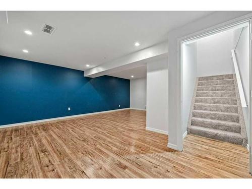 105 Patina Park Sw, Calgary, AB - Indoor Photo Showing Other Room