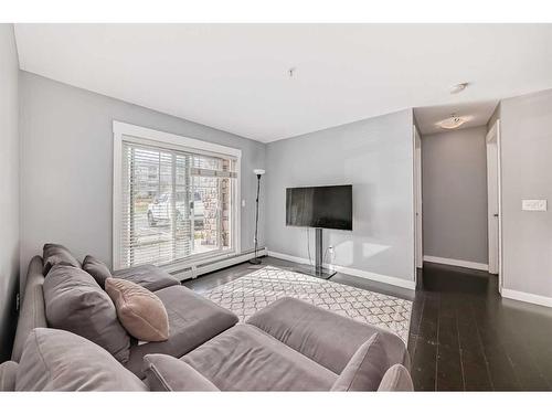 1113-11 Mahogany Row Se, Calgary, AB - Indoor Photo Showing Living Room