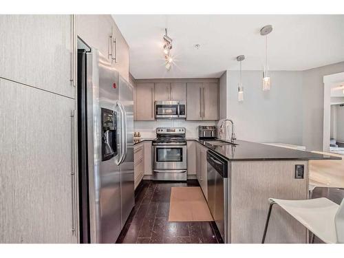 1113-11 Mahogany Row Se, Calgary, AB - Indoor Photo Showing Kitchen With Stainless Steel Kitchen With Upgraded Kitchen