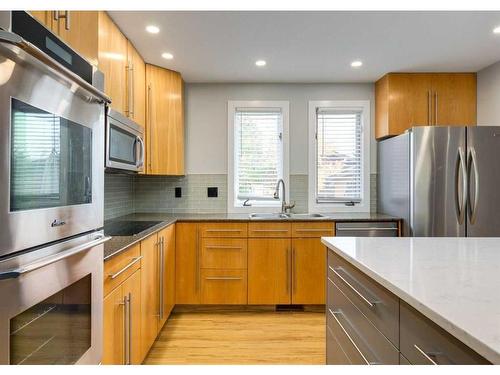 308 Silvergrove Bay Nw, Calgary, AB - Indoor Photo Showing Kitchen With Double Sink