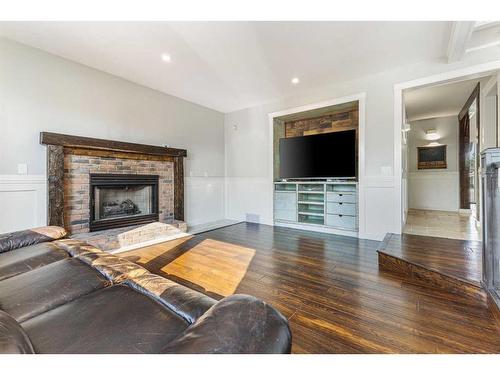 311 Hawkland Place Nw, Calgary, AB - Indoor Photo Showing Living Room With Fireplace