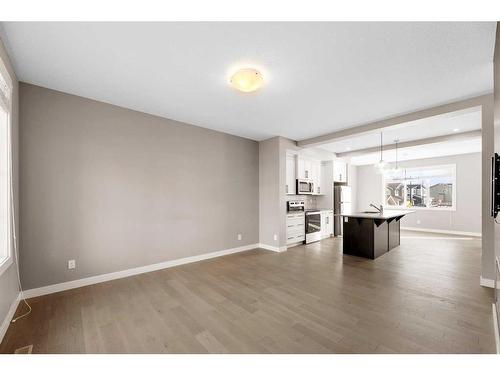 38 Precedence Glen, Cochrane, AB - Indoor Photo Showing Living Room