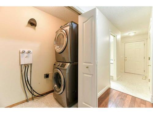 338 Mt Douglas Manor Se, Calgary, AB - Indoor Photo Showing Laundry Room