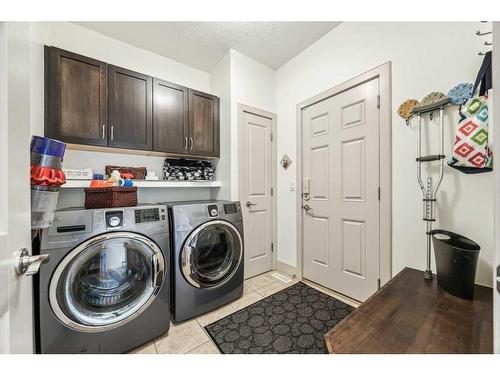 135 Tuscany Ravine Heights Nw, Calgary, AB - Indoor Photo Showing Laundry Room