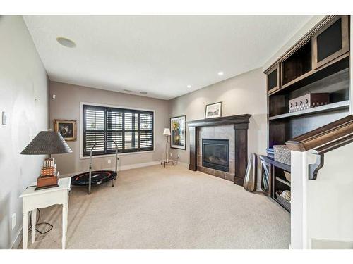 135 Tuscany Ravine Heights Nw, Calgary, AB - Indoor With Fireplace