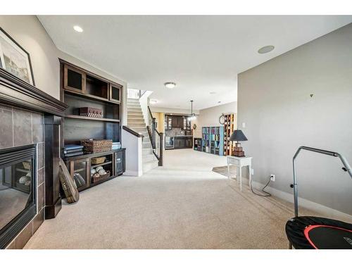 135 Tuscany Ravine Heights Nw, Calgary, AB - Indoor With Fireplace