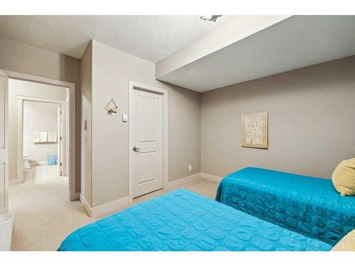 135 Tuscany Ravine Heights Nw, Calgary, AB - Indoor Photo Showing Bedroom