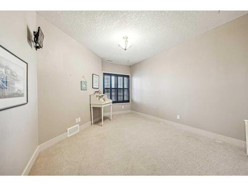 135 Tuscany Ravine Heights Nw, Calgary, AB - Indoor Photo Showing Other Room