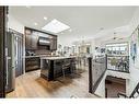 135 Tuscany Ravine Heights Nw, Calgary, AB  - Indoor Photo Showing Kitchen With Stainless Steel Kitchen With Upgraded Kitchen 