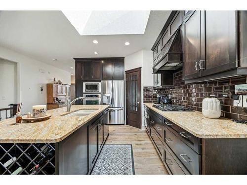 135 Tuscany Ravine Heights Nw, Calgary, AB - Indoor Photo Showing Kitchen With Stainless Steel Kitchen With Double Sink With Upgraded Kitchen