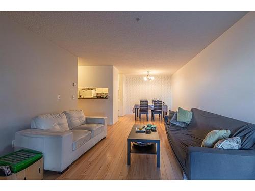 2112-20 Harvest Rose Park Ne, Calgary, AB - Indoor Photo Showing Living Room