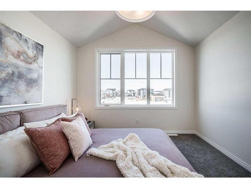 40 Ellen Lane, Crossfield, AB - Indoor Photo Showing Bedroom