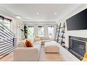 2213 26A Street Sw, Calgary, AB  - Indoor Photo Showing Living Room With Fireplace 