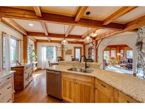 100-352246 242 Avenue West, Rural Foothills County, AB - Indoor Photo Showing Kitchen With Double Sink