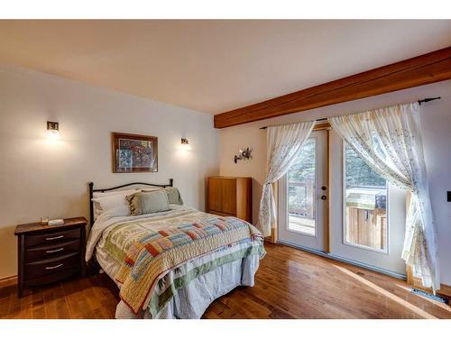 100-352246 242 Avenue West, Rural Foothills County, AB - Indoor Photo Showing Bedroom