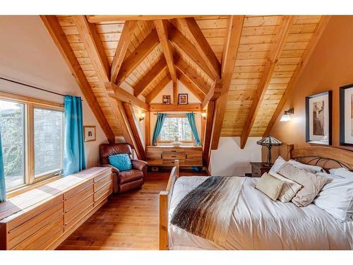 100-352246 242 Avenue West, Rural Foothills County, AB - Indoor Photo Showing Bedroom