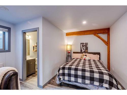 100-352246 242 Avenue West, Rural Foothills County, AB - Indoor Photo Showing Bedroom