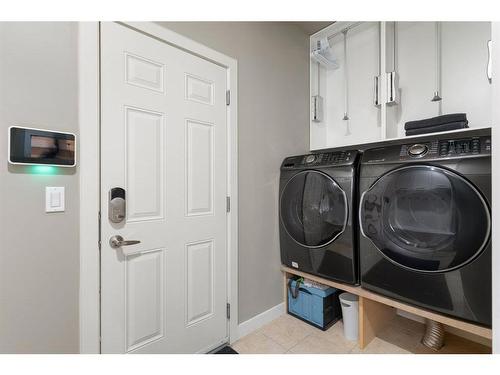 421 River Heights Drive, Cochrane, AB - Indoor Photo Showing Laundry Room