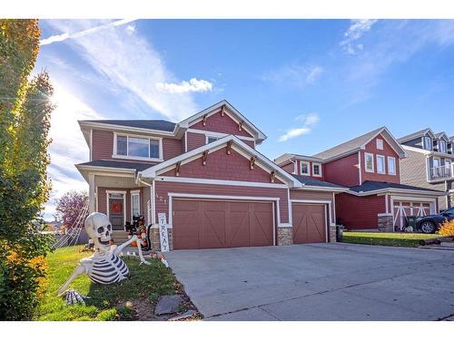 421 River Heights Drive, Cochrane, AB - Outdoor With Facade