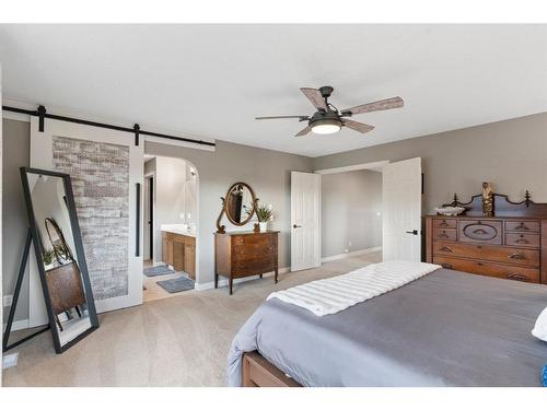 421 River Heights Drive, Cochrane, AB - Indoor Photo Showing Bedroom