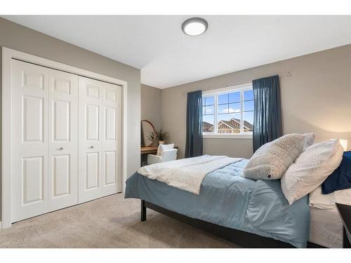 421 River Heights Drive, Cochrane, AB - Indoor Photo Showing Bedroom