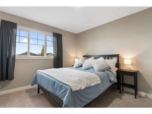 421 River Heights Drive, Cochrane, AB - Indoor Photo Showing Bedroom