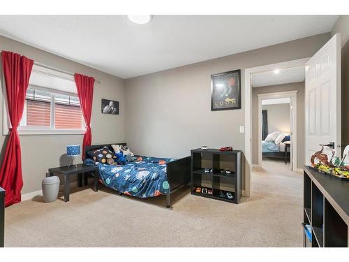 421 River Heights Drive, Cochrane, AB - Indoor Photo Showing Bedroom