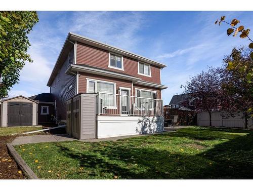 421 River Heights Drive, Cochrane, AB - Outdoor With Deck Patio Veranda