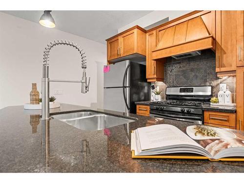 101-1818 14 Street Sw, Calgary, AB - Indoor Photo Showing Kitchen With Double Sink