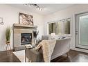 101-1818 14 Street Sw, Calgary, AB  - Indoor Photo Showing Living Room With Fireplace 