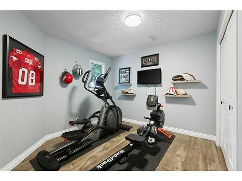 145 Candle Place Sw, Calgary, AB - Indoor Photo Showing Gym Room