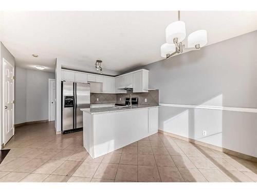 80 Saddlecreek Terrace Ne, Calgary, AB - Indoor Photo Showing Kitchen