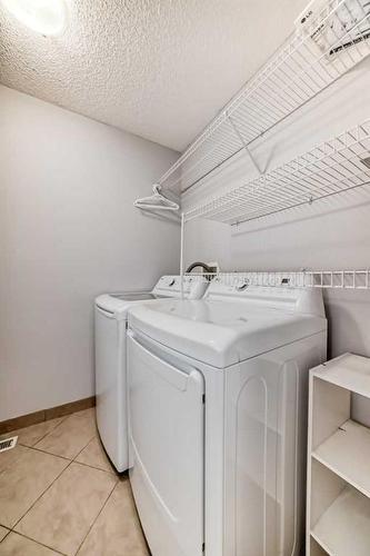 80 Saddlecreek Terrace Ne, Calgary, AB - Indoor Photo Showing Laundry Room