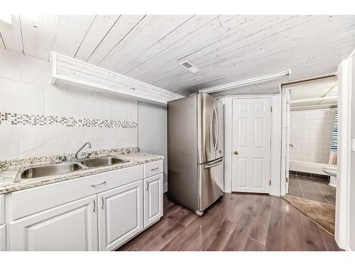 80 Saddlecreek Terrace Ne, Calgary, AB - Indoor Photo Showing Kitchen With Double Sink