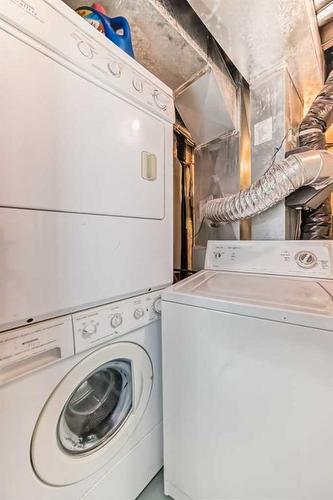 80 Saddlecreek Terrace Ne, Calgary, AB - Indoor Photo Showing Laundry Room