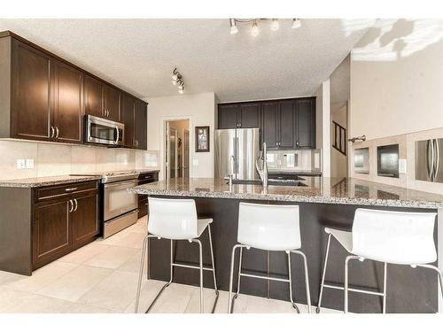 113 Everhollow Rise Sw, Calgary, AB - Indoor Photo Showing Kitchen With Stainless Steel Kitchen With Upgraded Kitchen