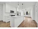 3113-111 Wolf Creek Drive Se, Calgary, AB  - Indoor Photo Showing Kitchen With Double Sink With Upgraded Kitchen 