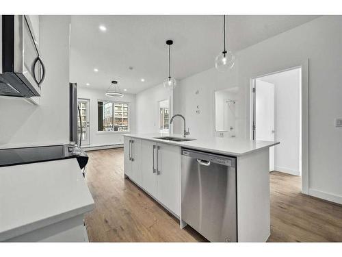 3113-111 Wolf Creek Drive Se, Calgary, AB - Indoor Photo Showing Kitchen With Upgraded Kitchen