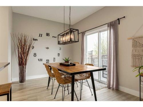 73 Crystal Shores Crescent, Okotoks, AB - Indoor Photo Showing Dining Room