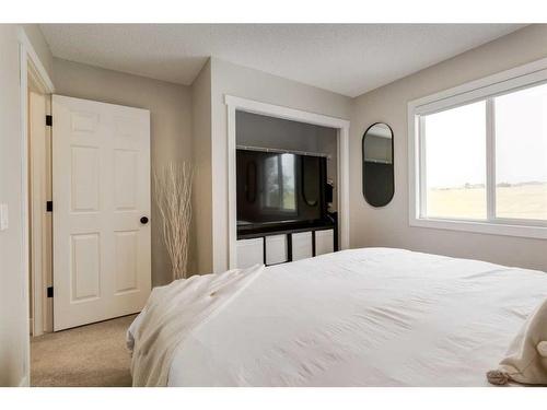 73 Crystal Shores Crescent, Okotoks, AB - Indoor Photo Showing Bedroom