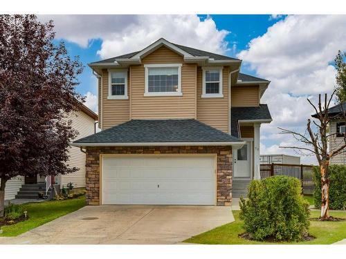 73 Crystal Shores Crescent, Okotoks, AB - Outdoor With Facade