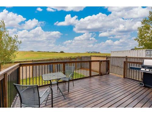 73 Crystal Shores Crescent, Okotoks, AB - Outdoor With Deck Patio Veranda With View